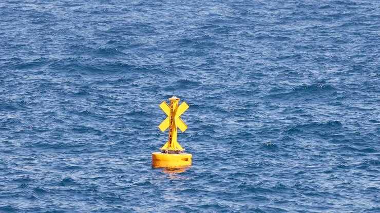 Yellow buoy floating in Monte Carlo waters