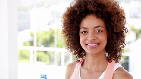 Fit-woman-drinking-water-from-bottle