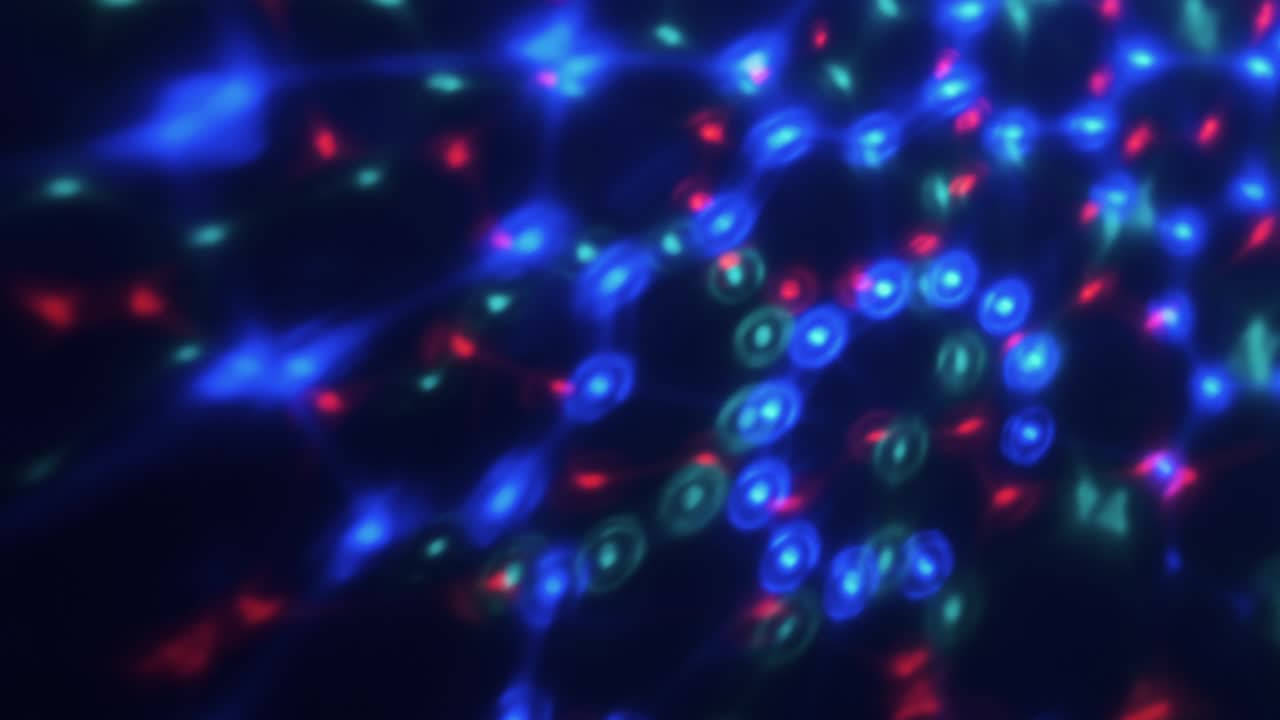 Rotation of multicolored lights on a black background