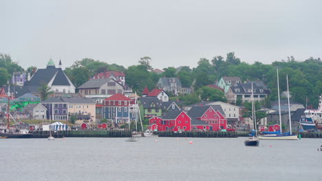 Small-colourful-community-town-in-Nova-Scotia,-Canada-on-an-overcast-day