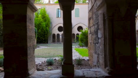 exterior view of garden in central area of a medieval french abbey.