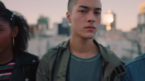 close-up-group-of-young-diverse-friends-hanging-out-on-rooftop-at-sunset-looking-confident-in-urban-city-gen-z-concept