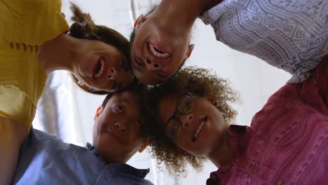 happy multi-ethnic business colleagues forming huddles in modern office 4k