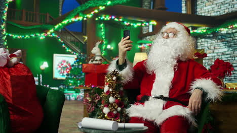 santa claus using smartphone