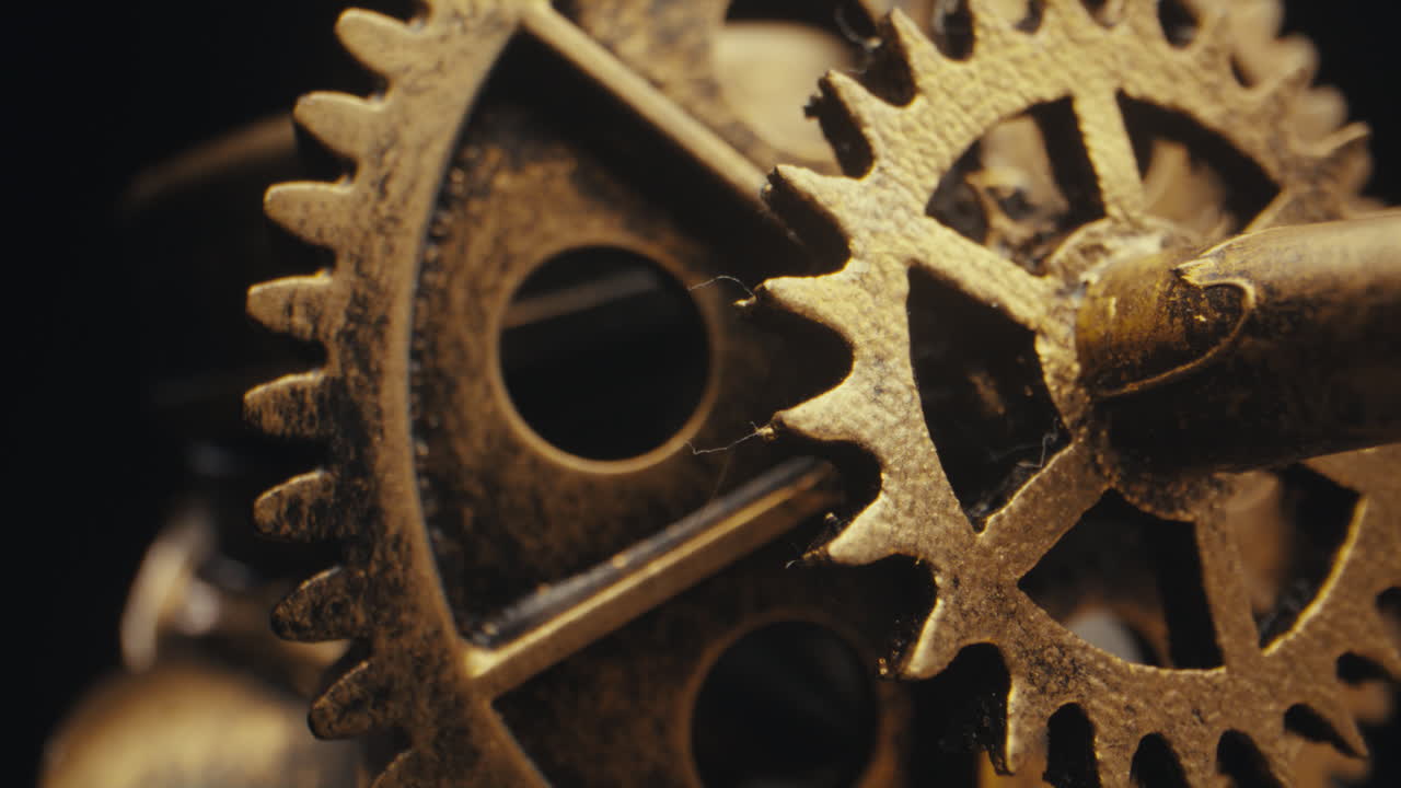 Close-up of Interlocking Golden Gears
