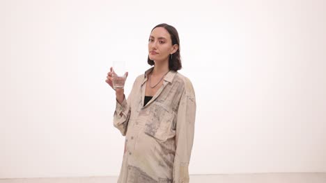 A woman drinks water
