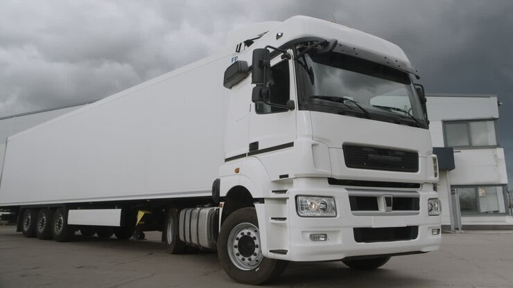 White Truck Transporting Cargo