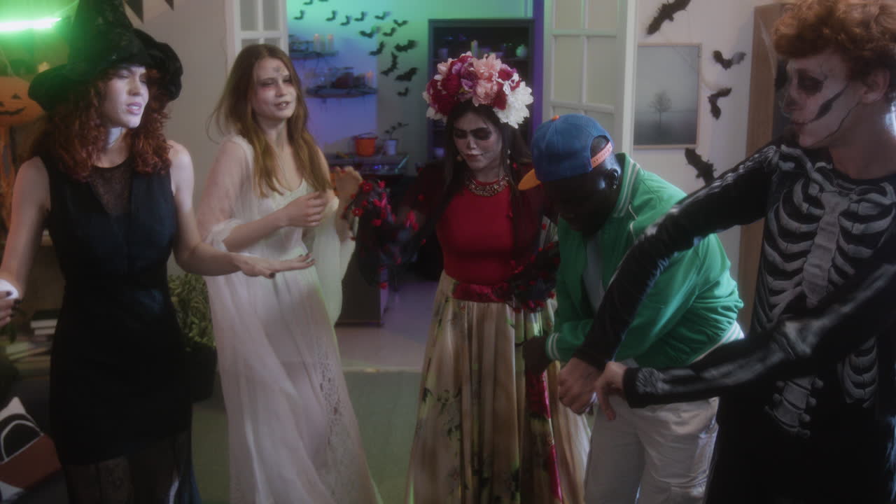 Group of Friends in Halloween Costumes