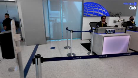 united airlines airport terminal with staff and passengers