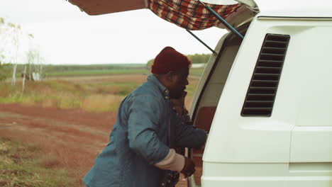 Diverse-Farmers-Loading-Vegetables-in-Van-after-Harvesting-Field