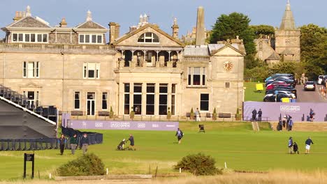 golfers playing at historic st andrews course