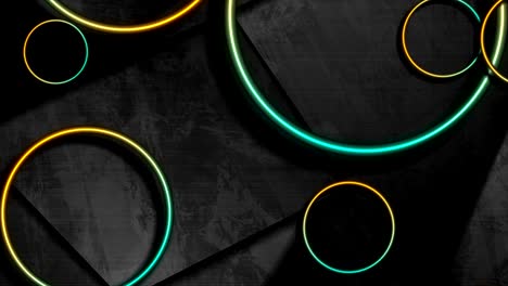 anillos móviles brillantes de neón en un fondo grunge oscuro