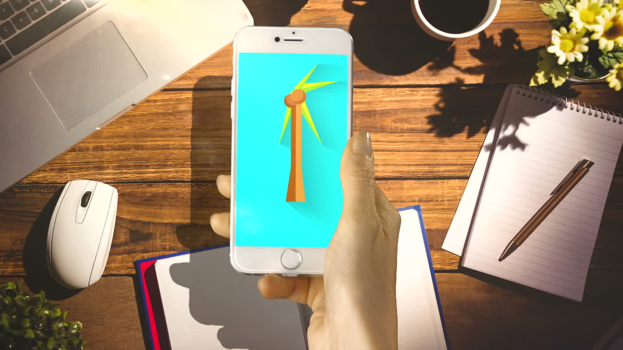 Hand touching digitally generated icon on mobile phone