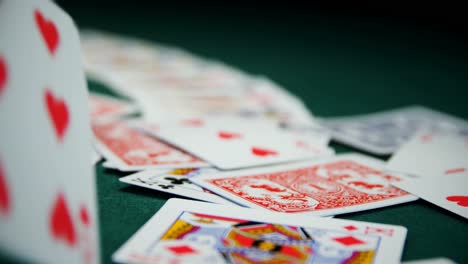 Playing-cards-on-poker-table-4k