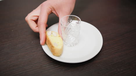 Hands Of Woman Are Composing A Plate With Biscuits To Welcome Guests Home