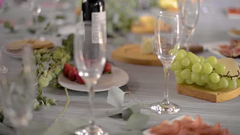 two women hands grabbing taking food snacks appetizer from a banquet celebration table