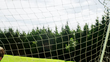 goalkeeper misses a save in the field