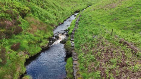 dane river flowing calmly in dane valley in united kingdom