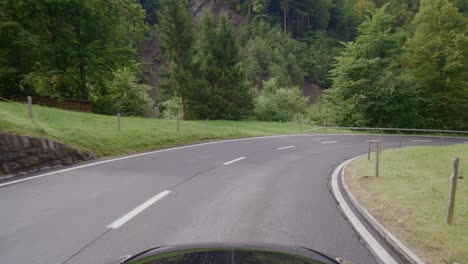 driving in the swiss alps from the famous grindelwald to lauterbrunnen in the rain