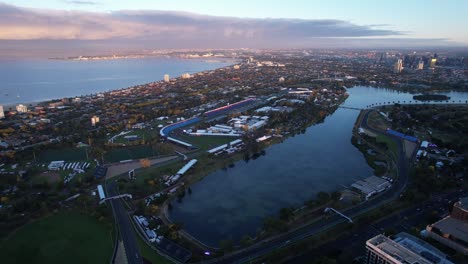 albert park lake, aerial orbit during sunset, melbourne recreation area, drone