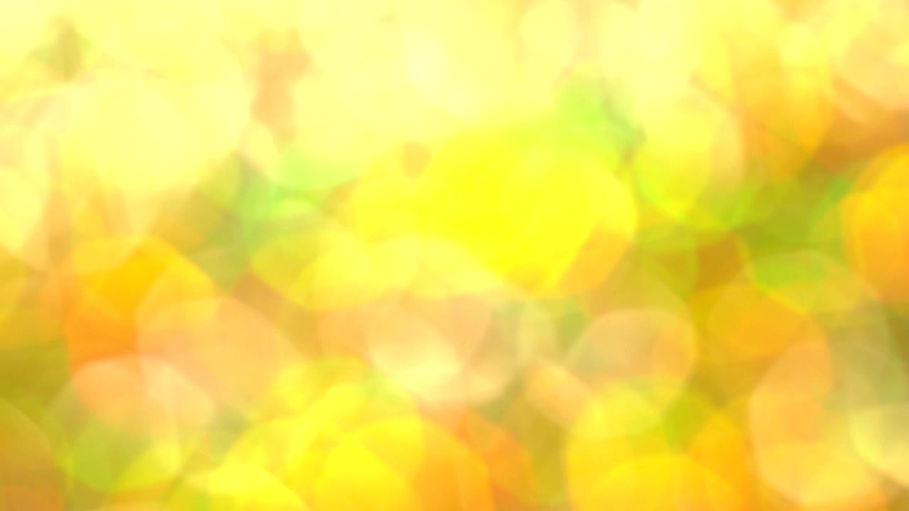 Luci e scintille sfocate astratte, multicolori, con glitter solari