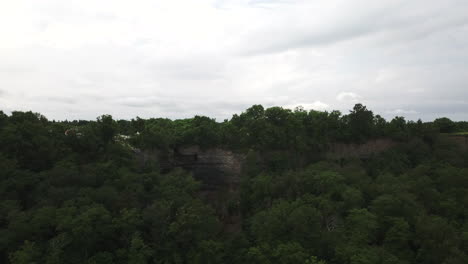 Establishing-Shot-Of-The-Valaste-Waterfall-In-between-Trees-In-Estonia