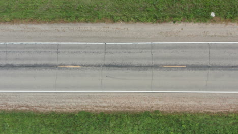 aerial top-down view of two-lane rural road in united states