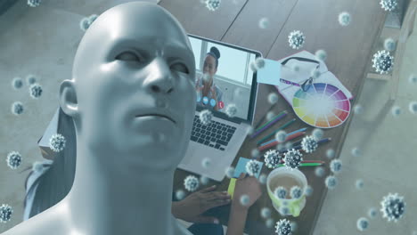 animation of covid 19 cells and human bust over businesswoman on laptop video call