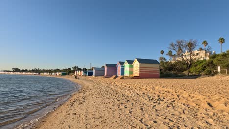 colorful beach huts along brighton beach, melbourne