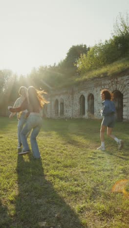 friends playing outdoors in a sunny park