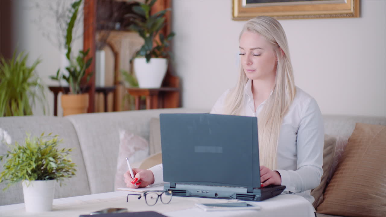 Businesswoman Working On Laptop On A Project At Home Office Young Woman Using Laptop Computer 2