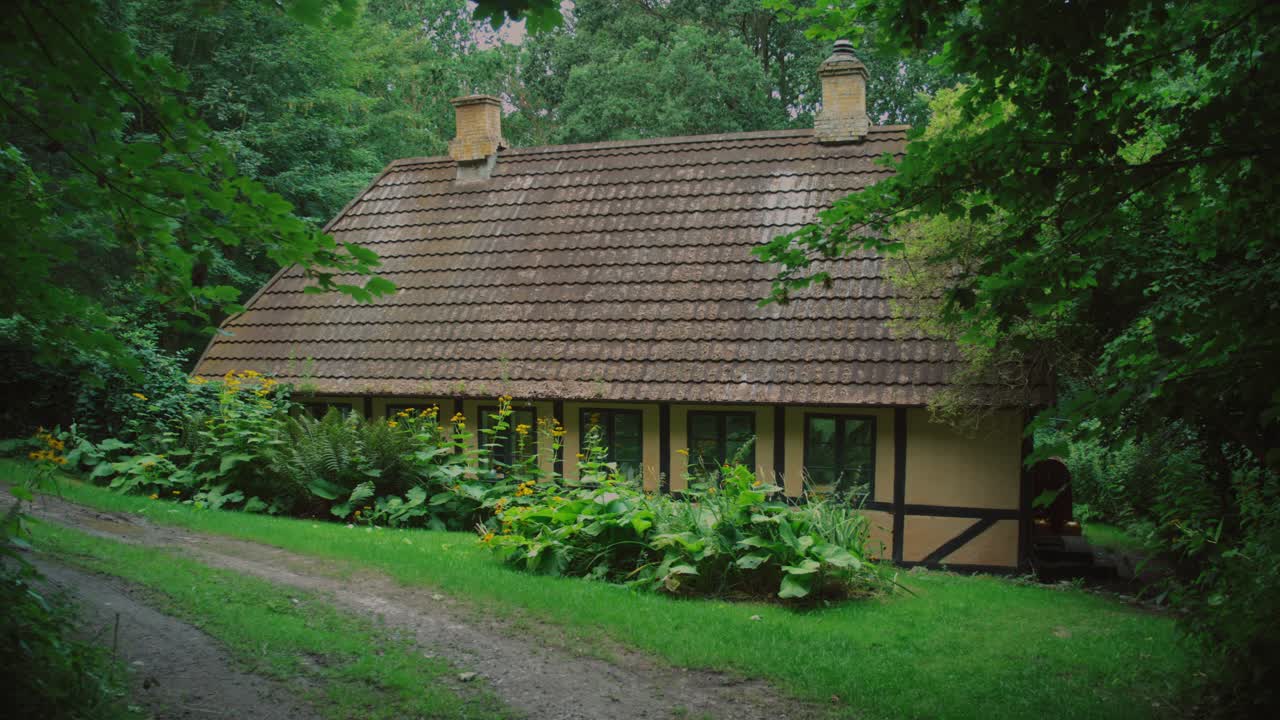 Beautiful house surrounded by lush greenery, located in Langeland, Denmark