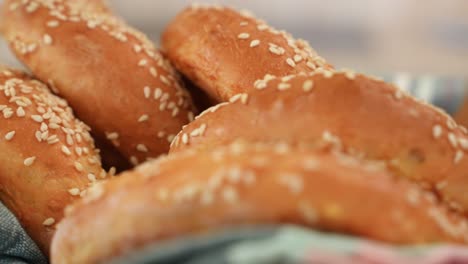 bagels with sesame seeds, close up in slow motion