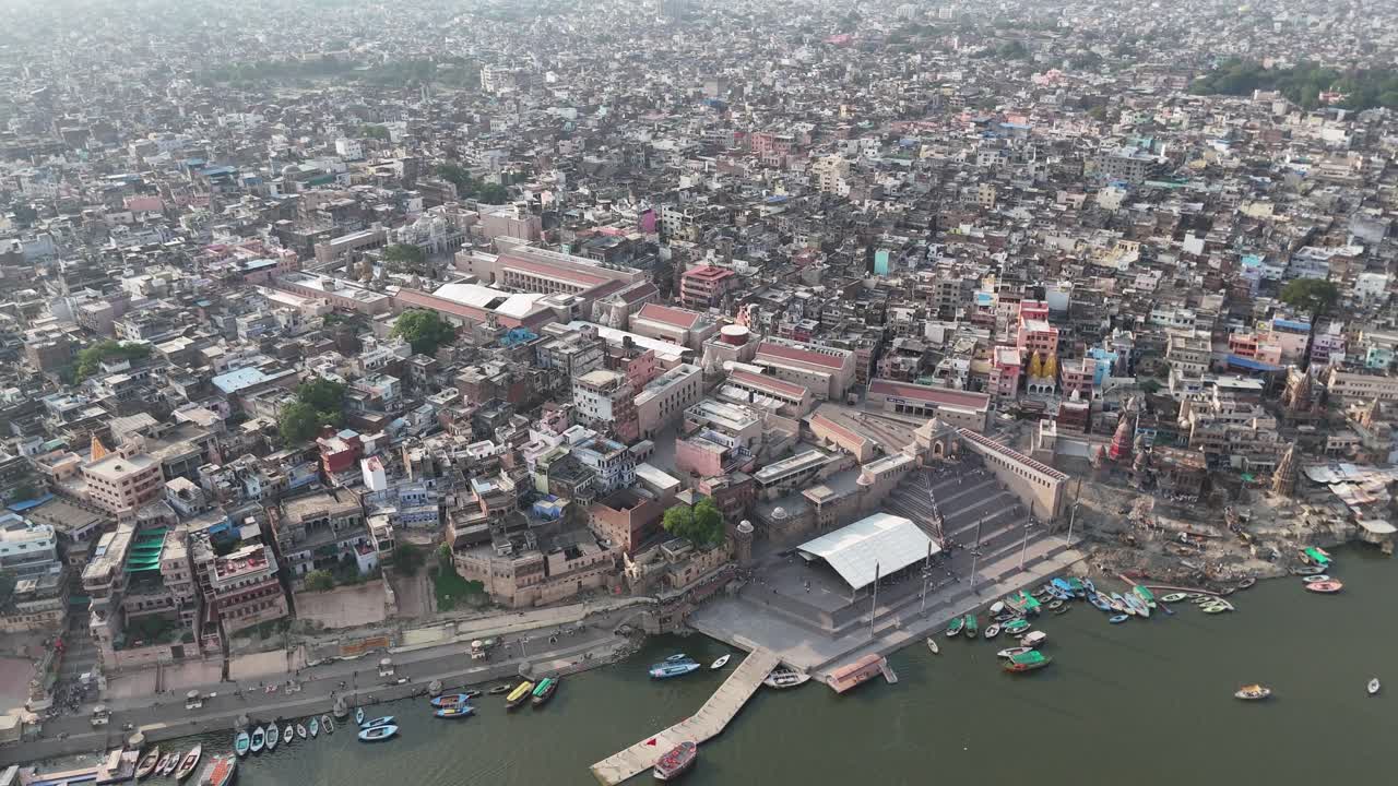 Overhead view of a sprawling Varanasi neighborhood, with the Ganges serving as the lifeline of this densely packed city.
