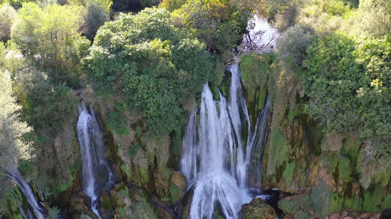 Kravica Waterfalls in Bosnia and Herzegovina on the Trebizat river seen from above, Aerial dolly in shot