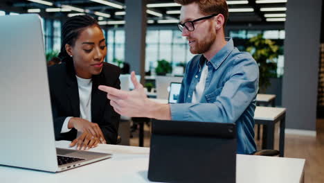 business professionals collaborating in a modern open-plan office