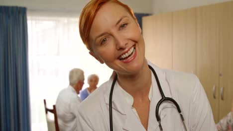 Portrait-of-female-doctor-in-a-retirement-home