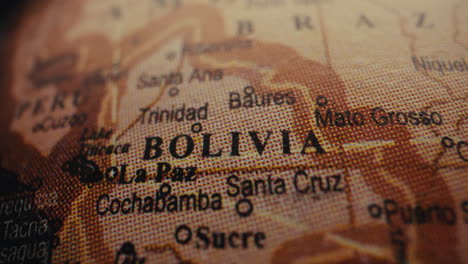 close-up of a world map highlighting bolivia