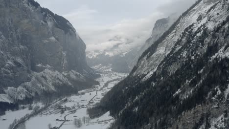 Drone-Aerial-of-Lauterbrunnen-surrounded-by-the-Mountain-Eiger-in-the-swiss-alps