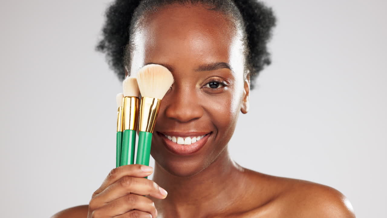 Face smile, makeup and black woman with brushes