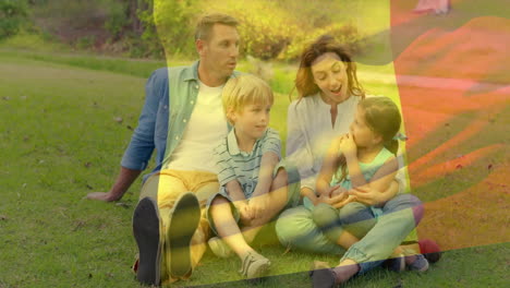 animation of flag of belgium over caucasian family spending time in park