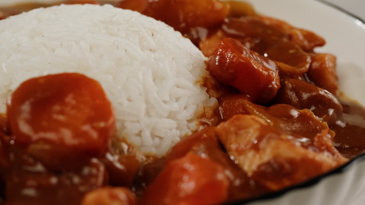 Japanese curry rice with fry pork Tonkatsu, Katsu Kare, Japanese breaded cooking dinner in restaurant, close up macro of asian food