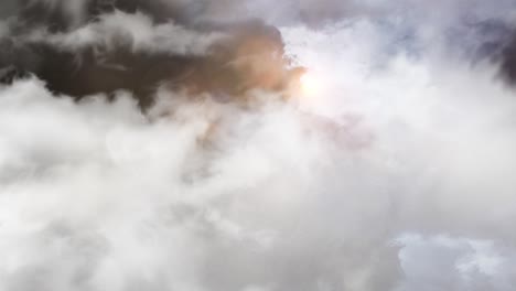 the-sunlight-shining-behind-the-thick-white-and-dark-clouds