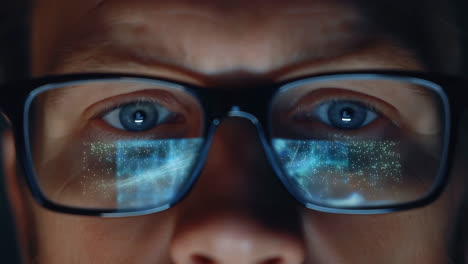 eyes with digital data reflections on glasses
