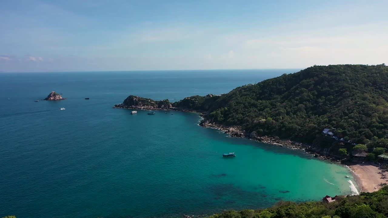 Drone aerial rising shot with Koh Tao Island and Shark Island