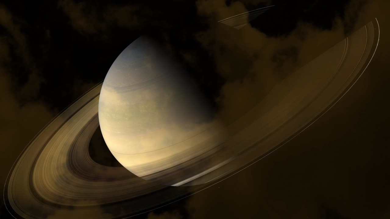 close up Saturn on the night sky and light orange cloud moving pass