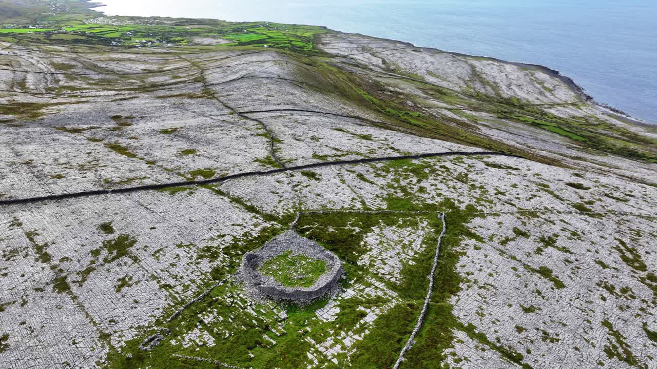 wild Ireland drone circling the ancient landmark of Caerndoonish ring Fort in The Burren Co. Clare ireland