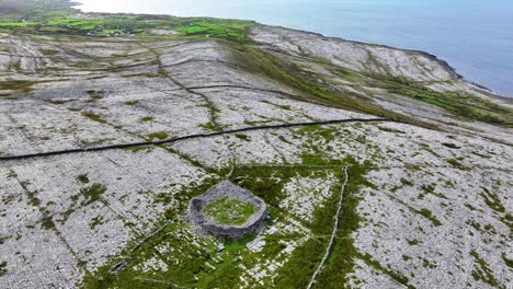 wild ireland drone circling the ancient landmark of caerndoonish ring fort in the burren co. clare ireland
