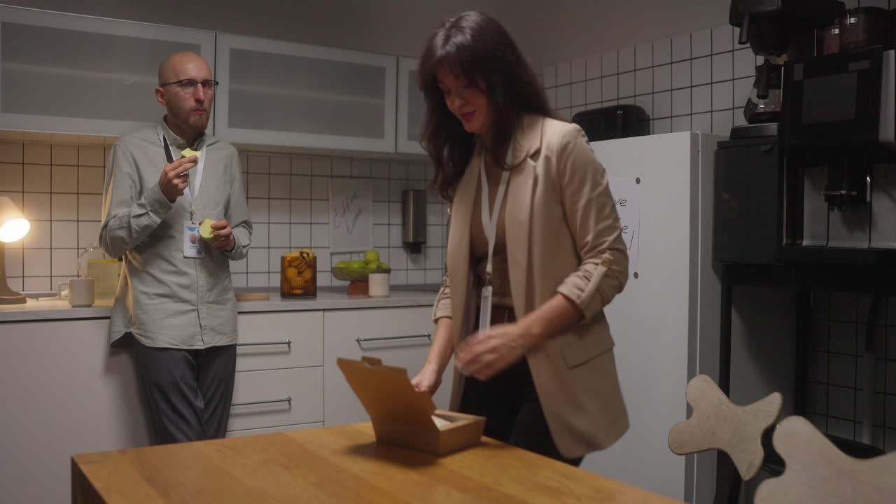 People having lunch in the office kitchen