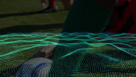 animation of spots over diverse male soccer players playing at stadium